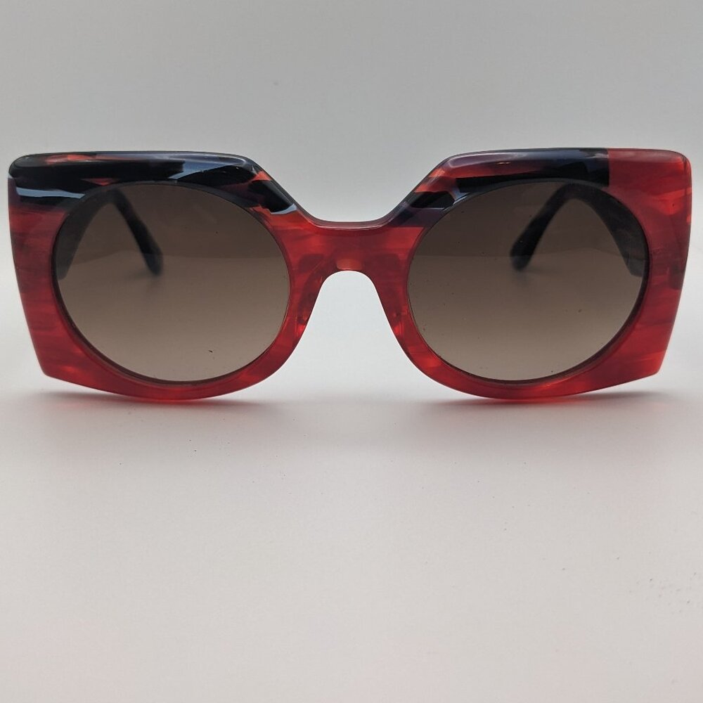 Tim Van Steenbergen red sunglasses